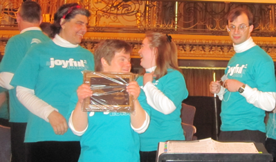 Jodi accepts Joyful Noise's plaque for performing at ACDA's 2011 National Conference